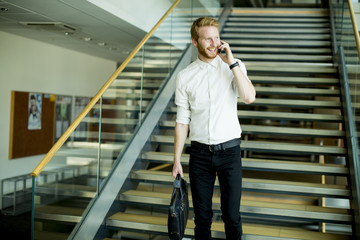 Young businessman on the stairs