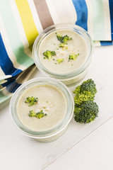 Broccoli cream soup on table