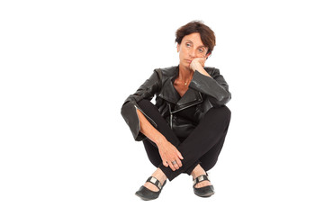 Fototapeta premium Beautiful woman doing different expressions in different sets of clothes: posing