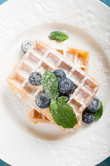 Delicious waffles with blueberris