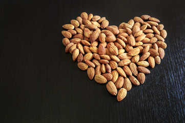 Pile of almonds in hreat shape