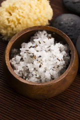 Homemade skin exfoliant (skin scrub) of sea salt, olive oil and