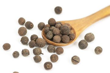 Allspice (Jamaica pepper) fruits on white