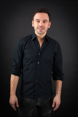 Fototapeta premium handsome man doing different expressions in different sets of clothes: love