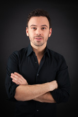 Obraz premium handsome man doing different expressions in different sets of clothes: arms crossed