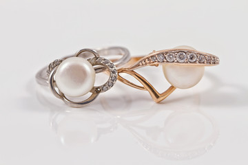 Elegant gold and silver ring with pearls