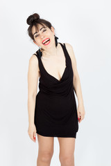 Fototapeta premium Beautiful woman doing different expressions in different sets of clothes: laughing