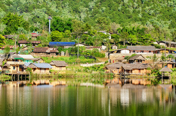 Fototapeta na wymiar reflection of old village in ban rak thai