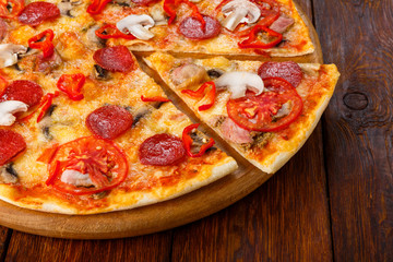 Delicious pizza with mushrooms, chili and pepperoni