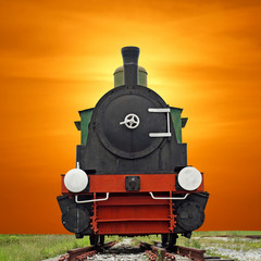 old steam engine locomotive train on beautiful sky background