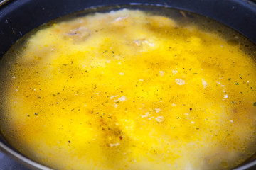 boiling broth closeup