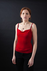 Beautiful woman doing different expressions in different sets of clothes: portrait