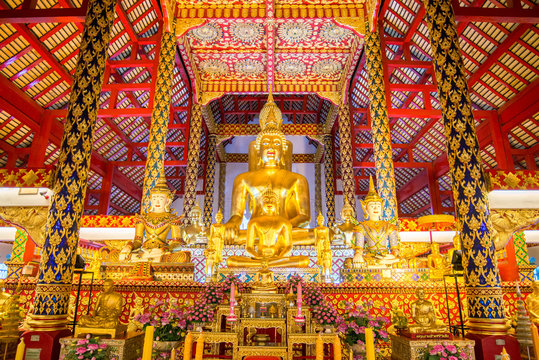 golden buddha statue in suan dok temple