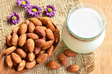 Almond with milk almond and violet flower.