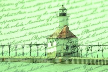 Double exposure St. Joseph north pier lighthouse along shoreline of Lake Michigan with old writing background  © larryhw