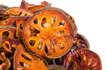dried quince slices on a white background