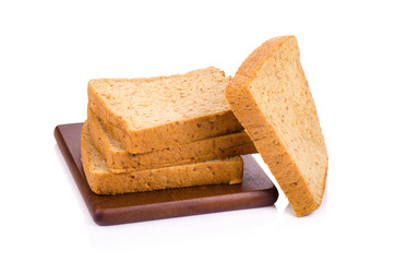 Slice of a whole wheat bread isolated on a white background