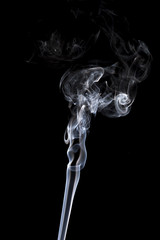 gray smoke on a black background.