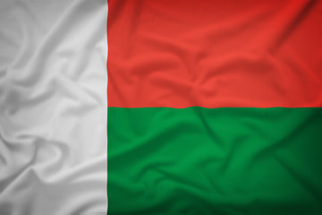 Madagascar flag on the fabric texture background,Vintage style