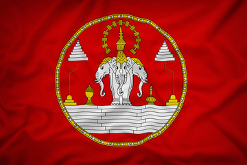 Royal Standard of Laos 1975 flag on the fabric texture backgroun
