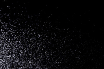 Drops of water on a black background. Texture.