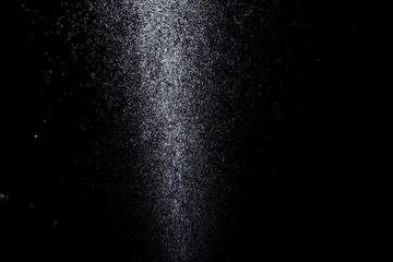 Drops of water on a black background. Texture.