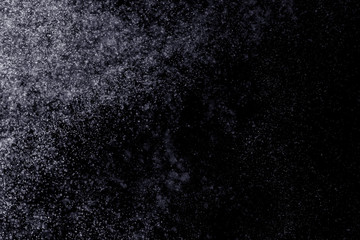 Drops of water on a black background. Texture.