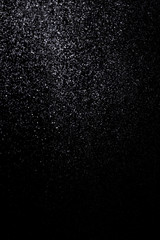 Drops of water on a black background. Texture.