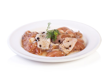 raw marinated chicken with black pepper