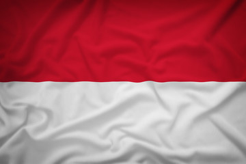 Indonesia flag on the fabric texture background,Vintage style
