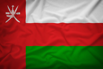 Oman flag on the fabric texture background,Vintage style