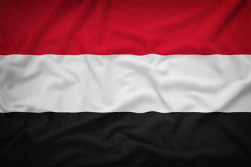 Yemen flag on the fabric texture background,Vintage style