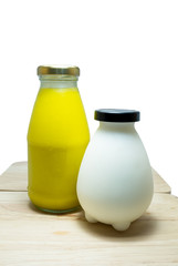 Fresh pumpkin juice and fresh milk in bottle; Healthy foods