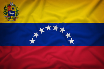 Venezuela flag on the fabric texture background,Vintage style
