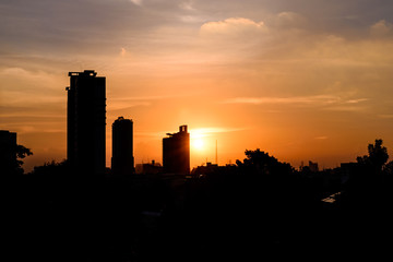 Fototapeta na wymiar Silhouette Building at Sunset.