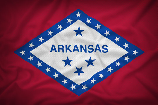Arkansas flag on the fabric texture background,Vintage style