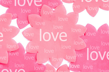 Love on pink paper flower.