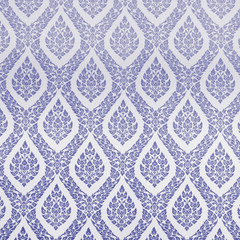 Drawings of flowers on the wall in Wat Tammaratana, Thailand.