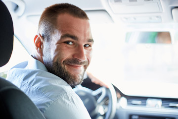 Young man in car