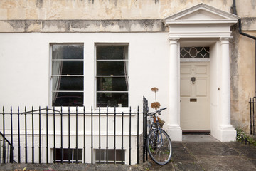 Victorian house front door with bicycle