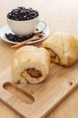 Bread cut sweet with fresh black coffee