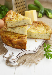 Zucchini pie with cheese and herbs