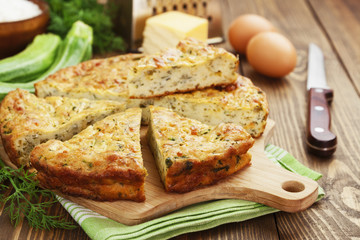 Zucchini pie with cheese and herbs