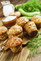 Muffins with zucchini, cheese and herbs