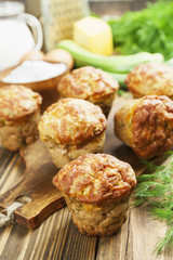 Muffins with zucchini, cheese and herbs