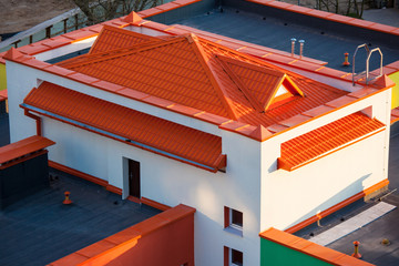 Fototapeta premium Beautiful small house with orange roof