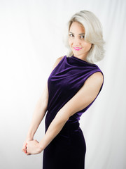 studio Photo of beautiful woman in dress