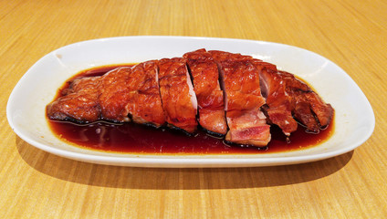 Plate of Roasted Duck, Chinese style . Shallow depth-of-field, Crispy Skin