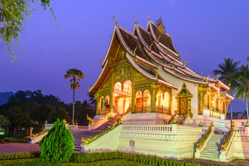 Naklejka premium Temple in Luang Prabang Royal Palace Museum at twilight time, La