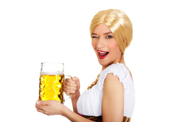 Beautiful bavarian woman with beer.